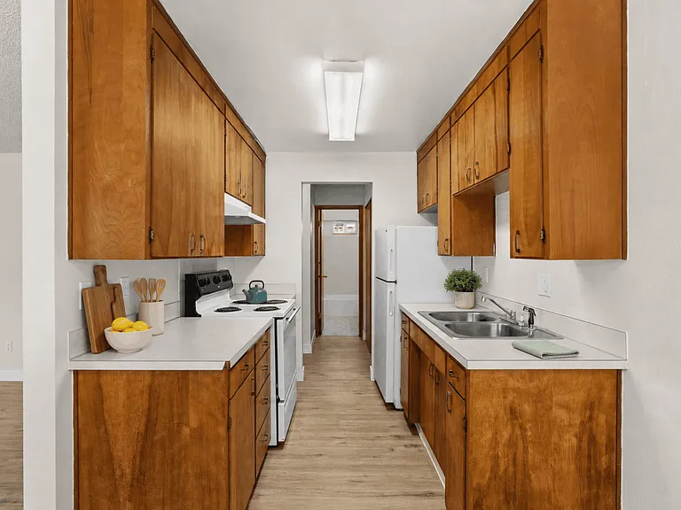 Functional kitchen in a one-bedroom deluxe apartment at Palisades Apartments in Tacoma, Washington.