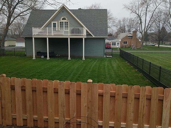 Securely fenced yard for small dog