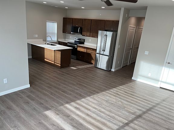 Well-designed kitchen/living room areas.