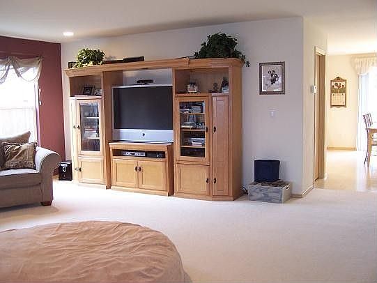 Entertainment center is actually rather large. Very nice room!