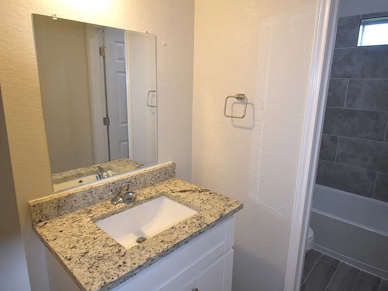 Bedroom 3 Vanity connected to shower room.