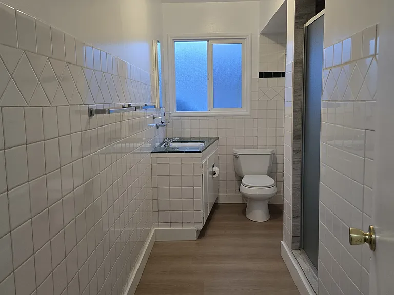 Bathroom with shower and bathtub