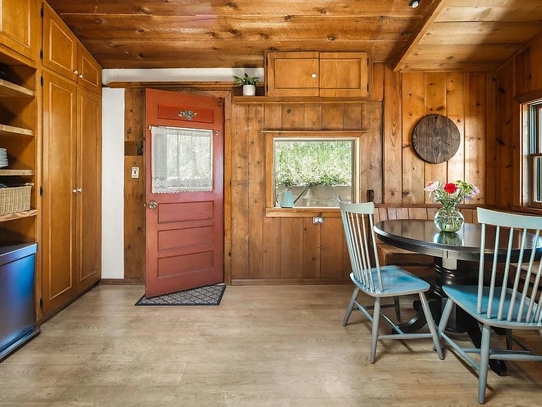 Breakfast nook and access to side patio from kitchen
