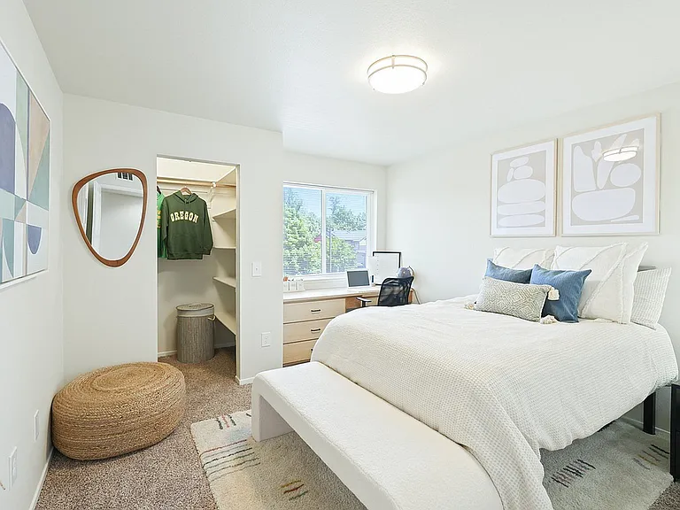 Experience serene living in this beautifully designed bedroom, perfect for relaxation.