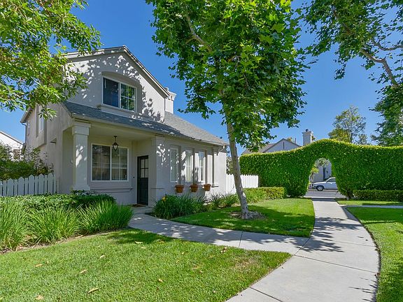 The front of the house with its immediate neighborhood.