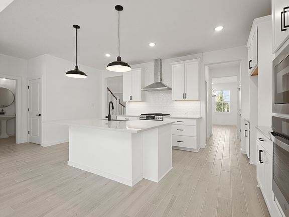 Kitchen with quartz island and countertop