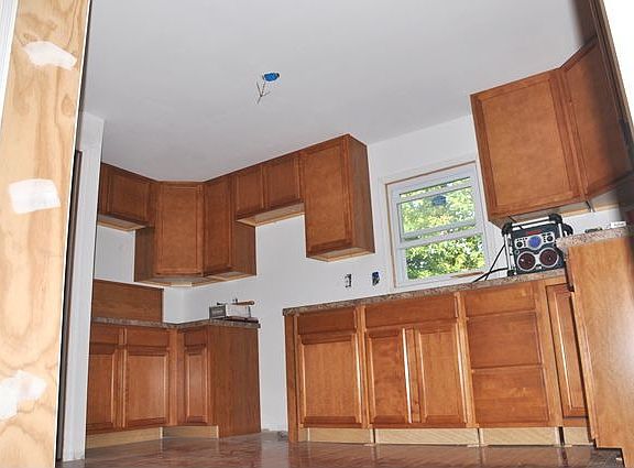 42 inch solid stained walnut cabinets
