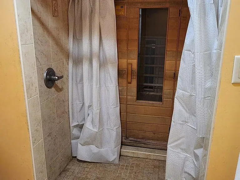 the shower and adjacent sauna