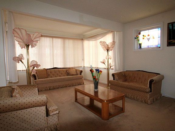 Bright living room with sun room