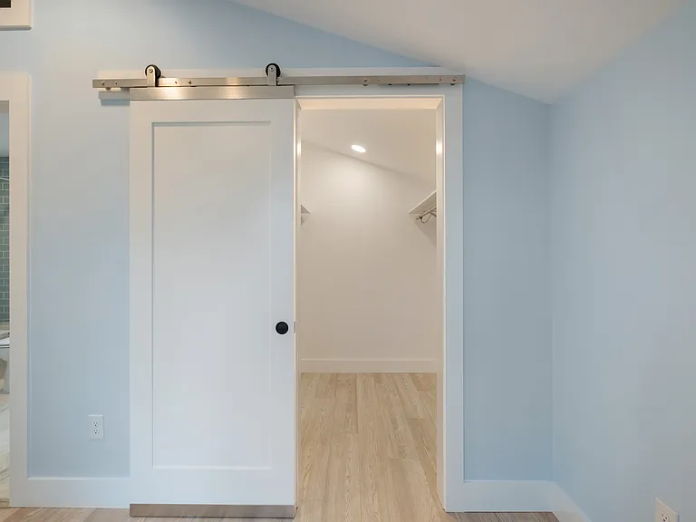 Upstairs bedroom walk-in closet.