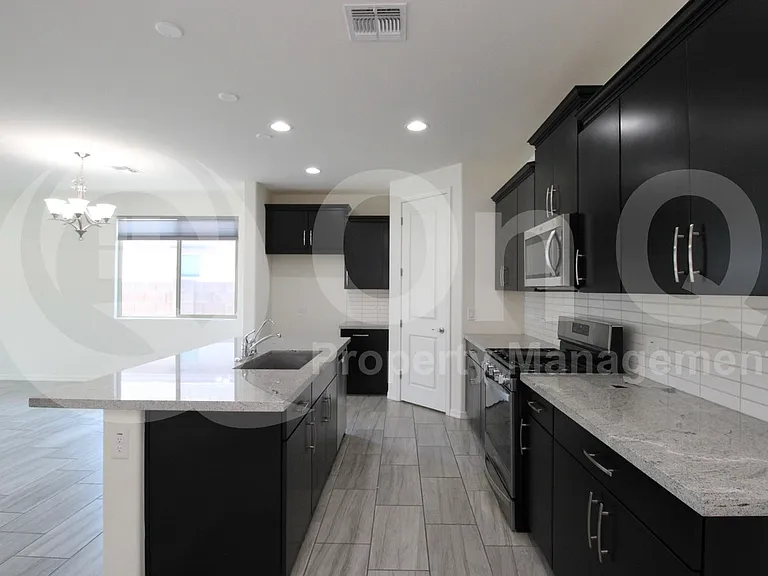 9114 S 167th Dr — Photo 42