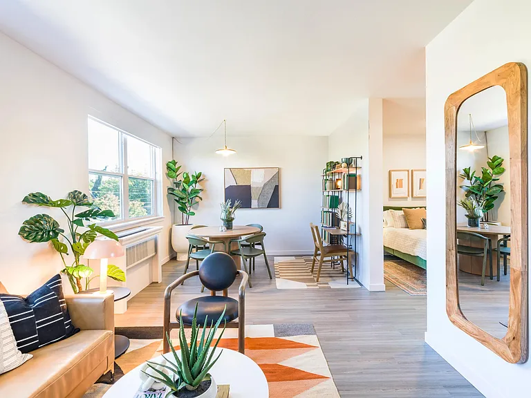 Relax and unwind in your stylish living space at Modera Woodstock. With Studio, 1-, 2-, and 4-bedroom homes available, you'll find the perfect setting to call home, complete with thoughtful design and modern comforts.