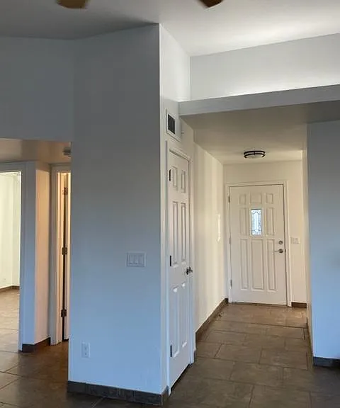 Front door and coat closet