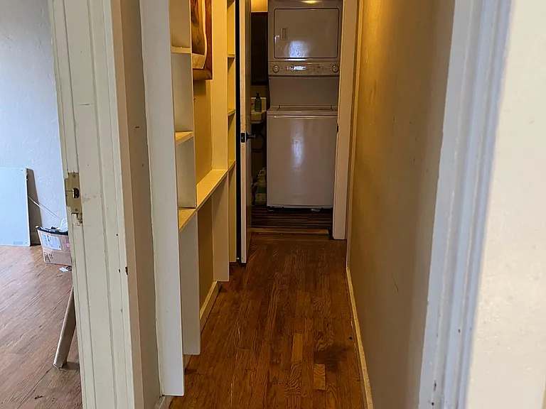 Hallway to bathroom-has room for a stackable WD