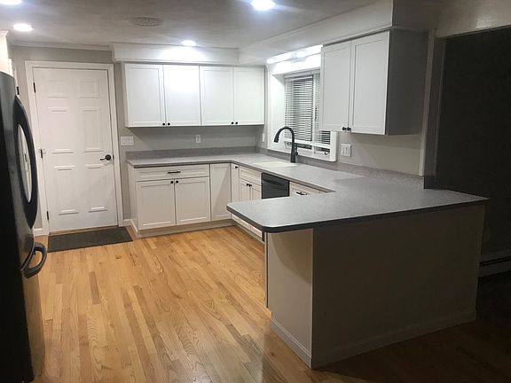 Fully applianced kitchen w/access to garage.