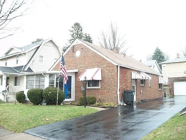 Brick Ranch with shared driveway, 1 - car garage
