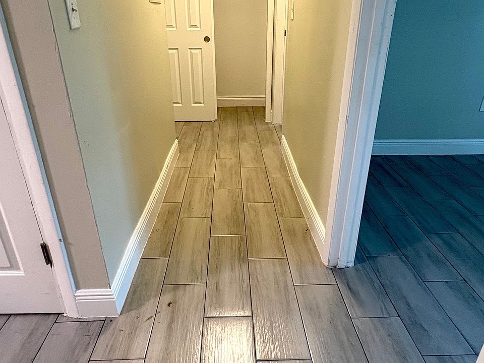 Hallway leading to bedrooms and bathroom. Also showing hall closet