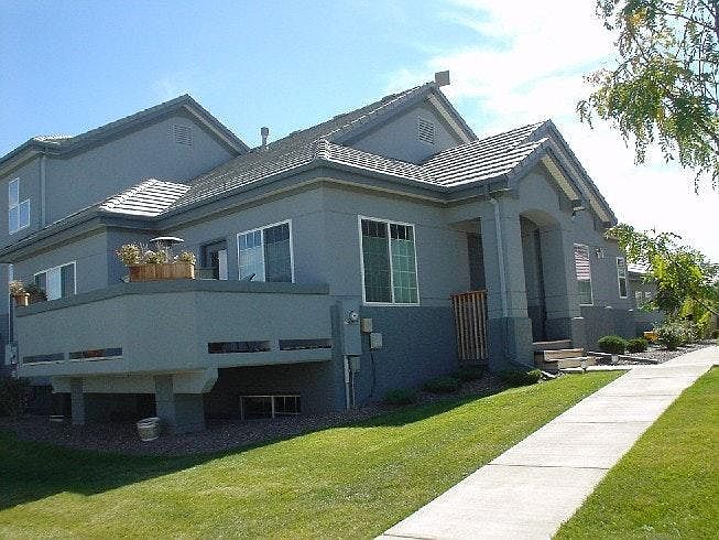 Grounds maintained by HOA. 2 car garage attached.