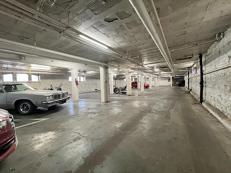 Heated garage in basement.