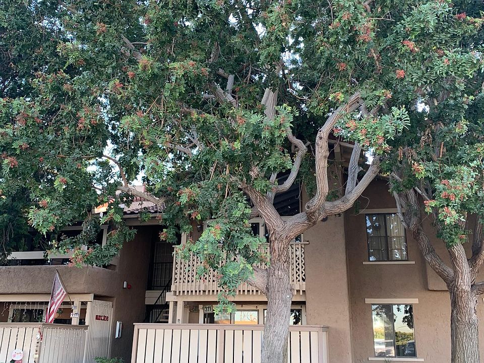 Inviting front entry welcomes you to this ground level townhouse