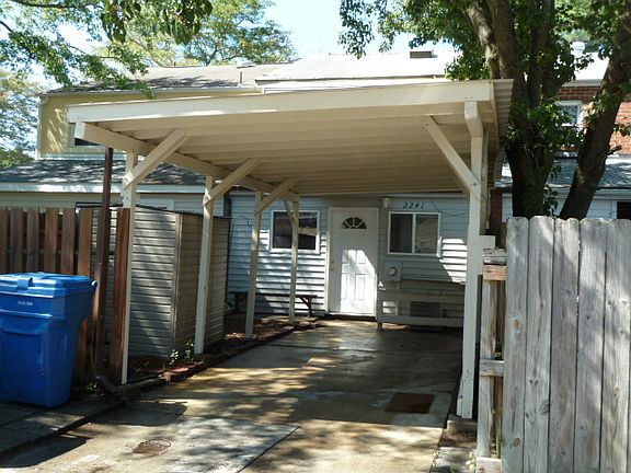 Carport in back alley
