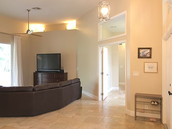 Living room opens to office