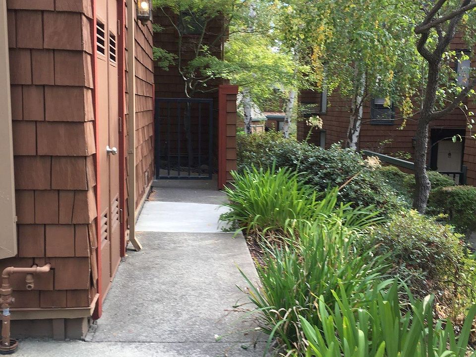 Enter the house from the driveway.