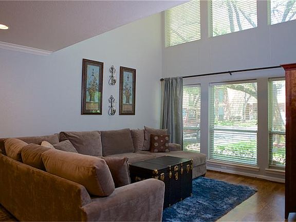 One of two large living areas with lots of light and high ceilings