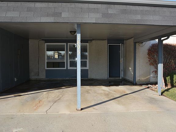 Double carport with additional storage closet