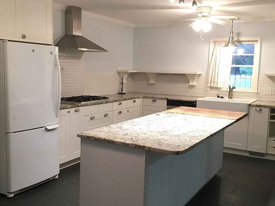 Kitchen (farmhouse sink, double ovens, dishwasher, gas stove, open shelving, large pantry cabinet, hidden trash pull-out)