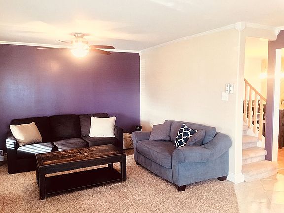 living room with stairs