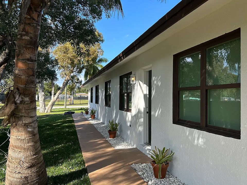 Front walkway to the unit. Shows the other duplex unit to the left