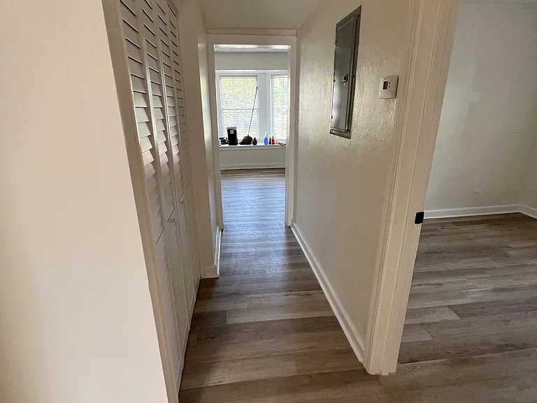 Hallway leading back to living area.