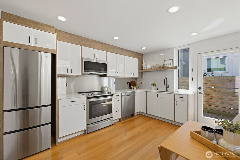 2nd image of 3645 22nd Avenue W #G