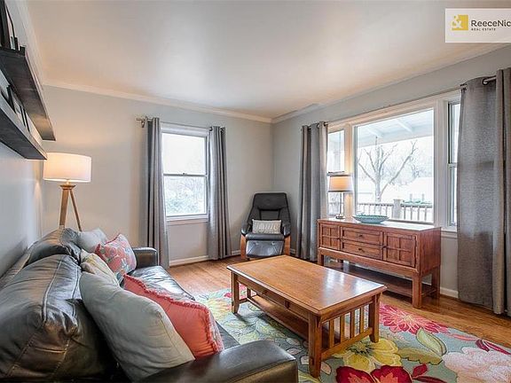 Beautiful living room with gleaming hardwood floors and great light.