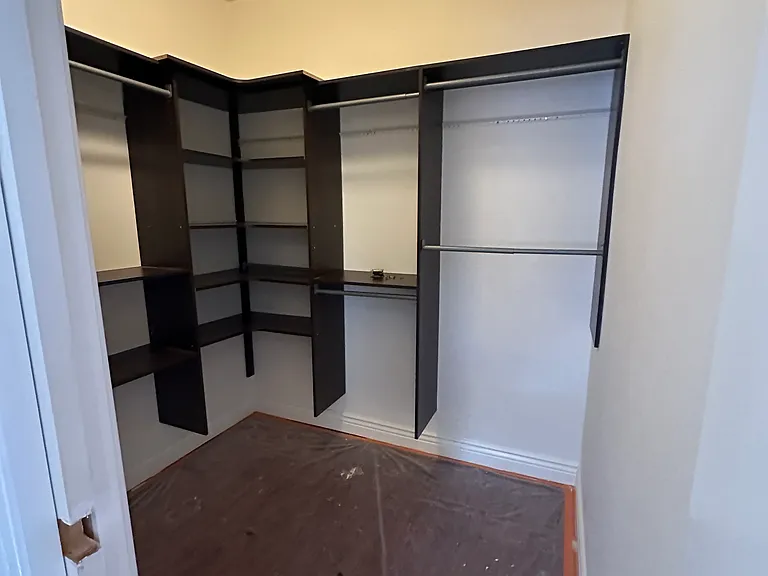 Master Bedroom Walk in Closet from outside door.