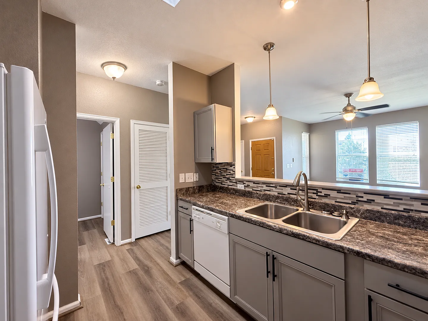 2-Bed Townhome | Updated Lvp Floors + 2-Car Garage — Photo 3