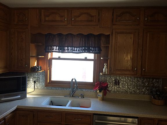 Kitchen with oak cabinets