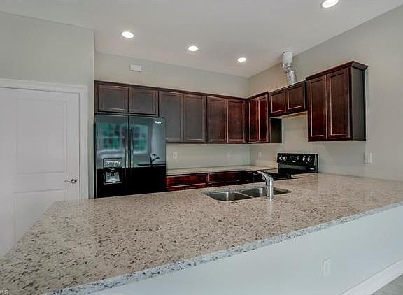 2nd image of 7135 Greenwood Park Cir #203