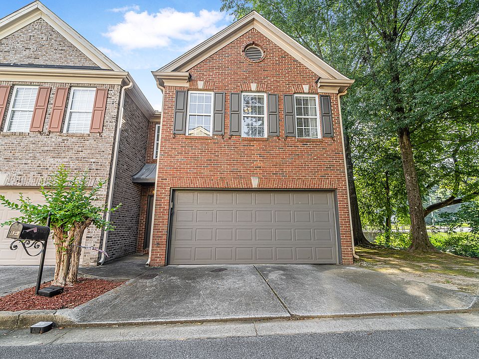 Gorgeous end unit brick townhouse with two car garage