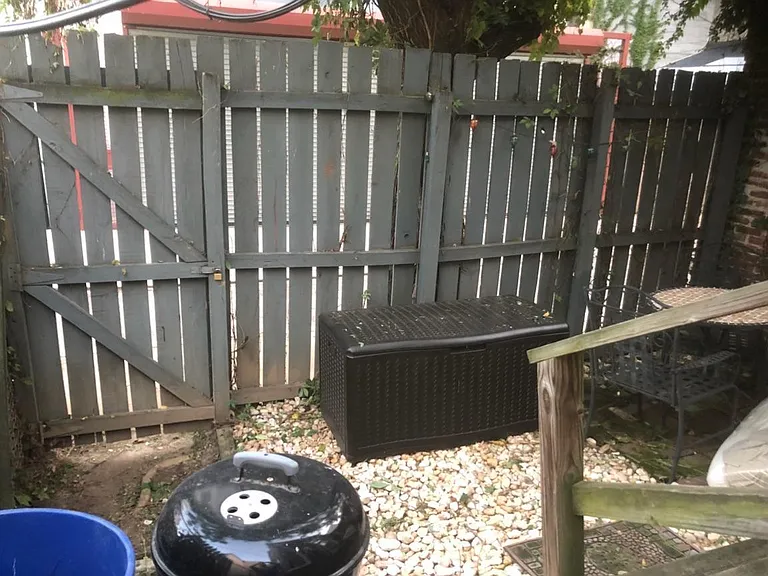 Private back patio, grilling OK per city code on ground/hard surface!