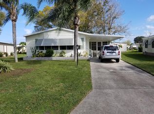 716 Hyacinth Cir, Barefoot Bay, FL 32976