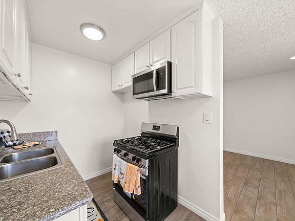 4th image of 11100 Pangborn Ave APT H