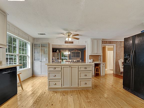 KITCHEN LOOKING INTO DINING