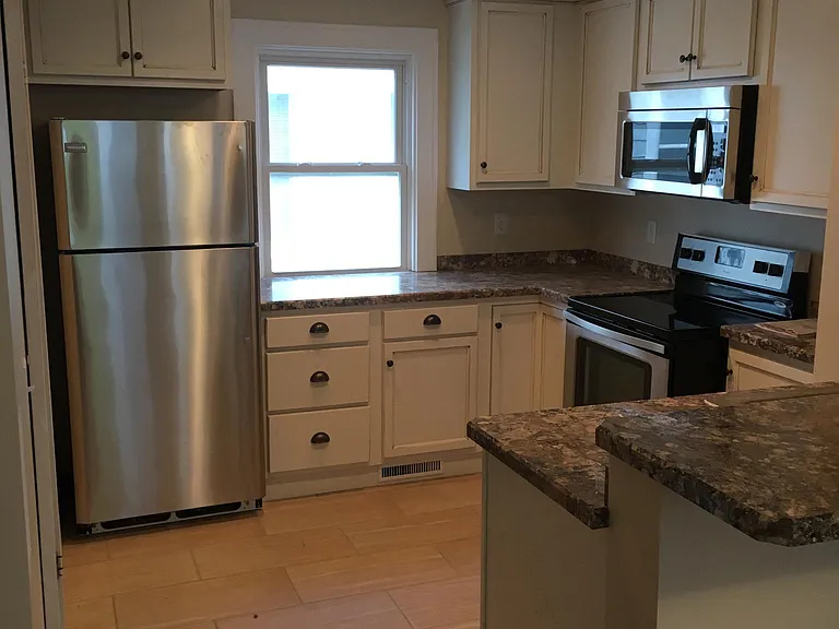 Brand new cabinets, new stainless appliances and new tile fl