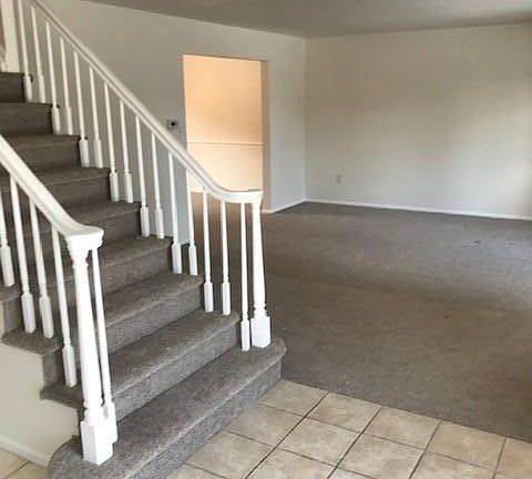 Large Living Room from Entry. 13.5x17. New Carpeting and Paint