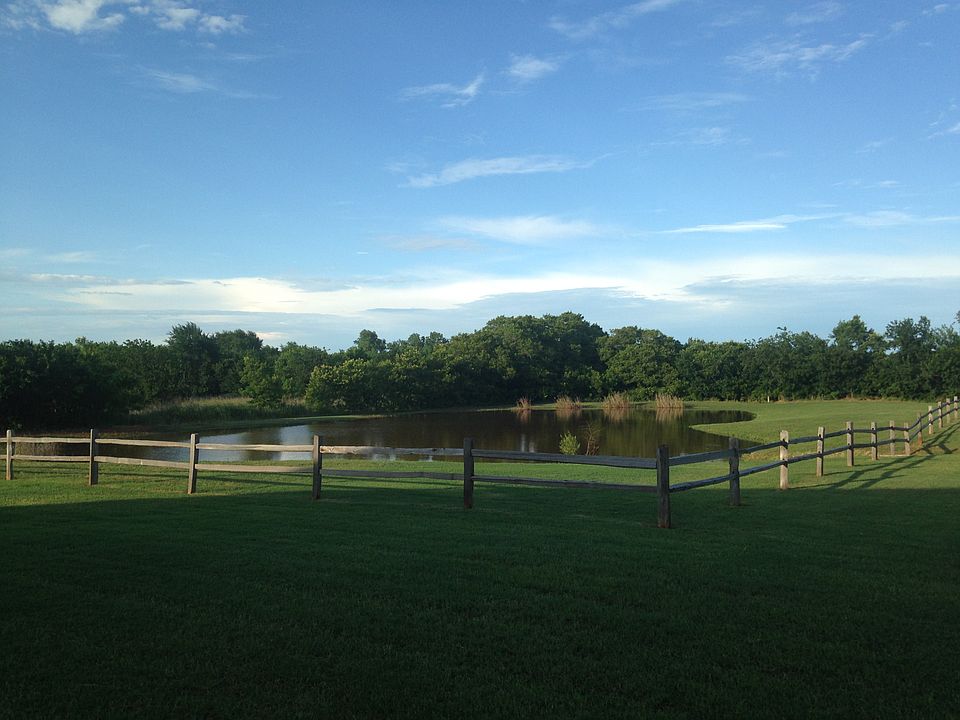 1.5 Acres with Pond!