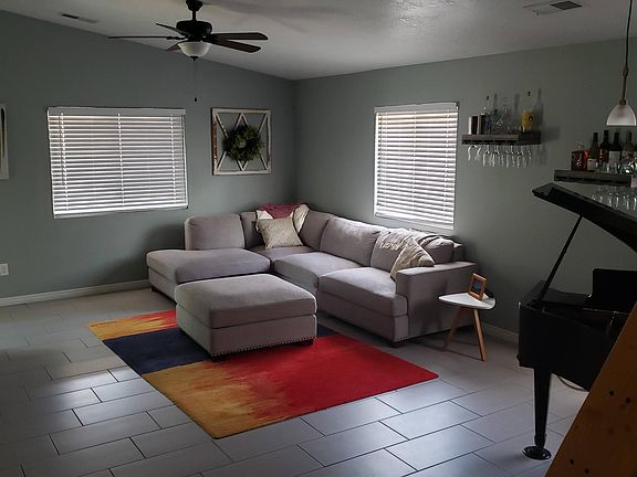 Spacious living room- new tile and recent paint.