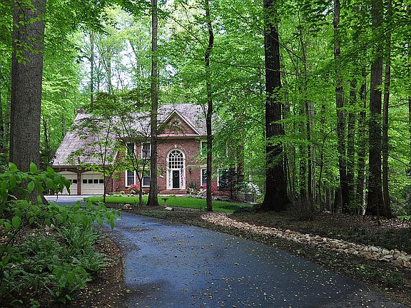 Wooded lot, set back