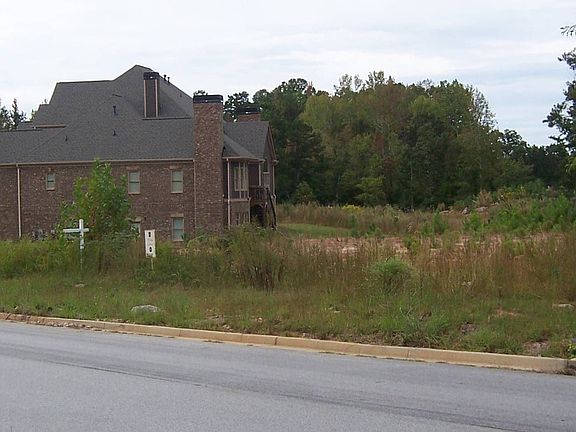 Lot & House to the Left
